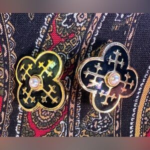 Black petal clip on earrings